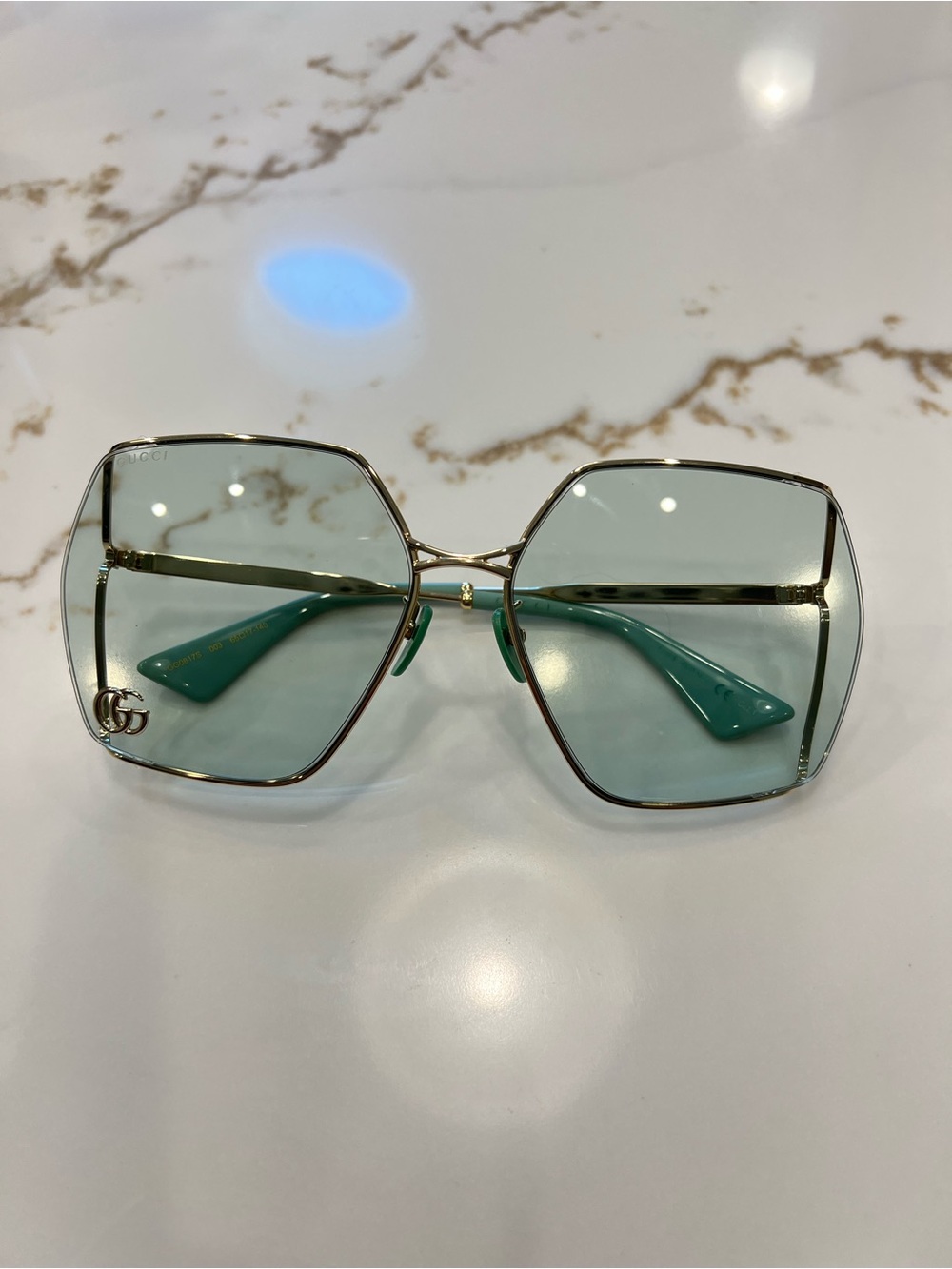 Gucci Gold-Frame Sunglasses with Light Teal Lenses